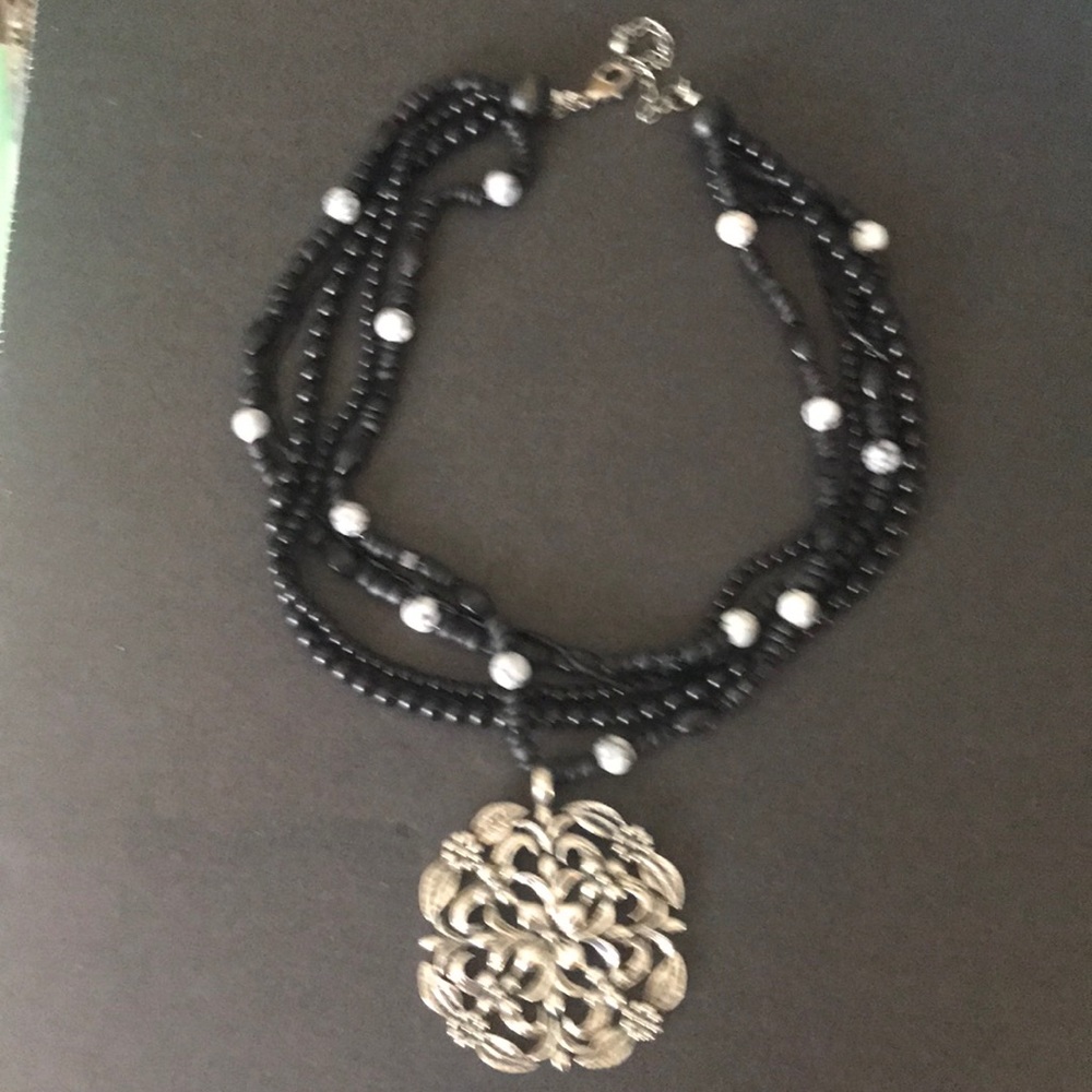 Victor Janson (VJ) Silver Pendant on Black Beads